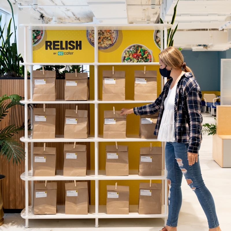 Person taking meal from a Relish shelf